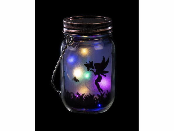 Lanterne solaire LED motif fée allumée dans la nuit sur fond noir
