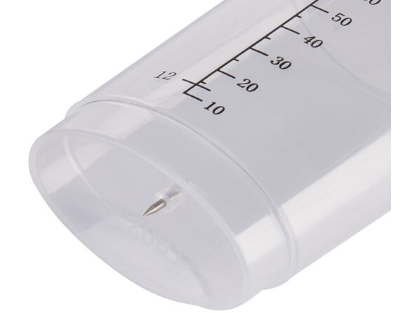 verre mesureur 70 ml vu de dessous avec pointe pour écailler les oeufs