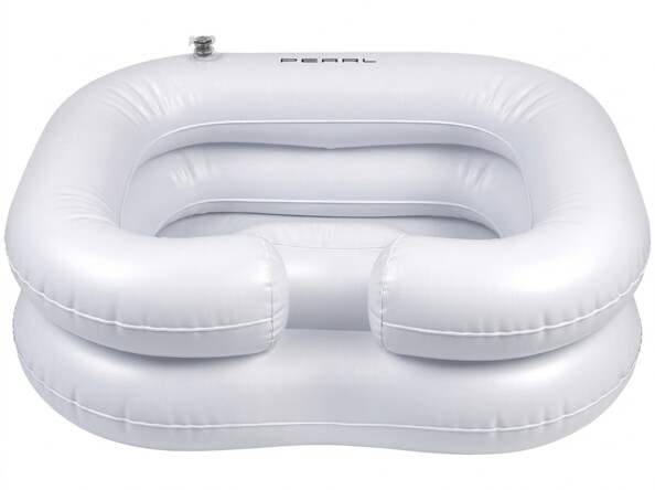 Bac à shampoing gonflable Pearl vu de face avec logo, coussins latéraux, appui-tête et valve de gonflage