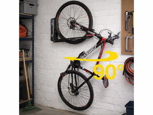 Support mural pour vélo de 16" à 29" mis en situation dans un garage avec orientation à 90°