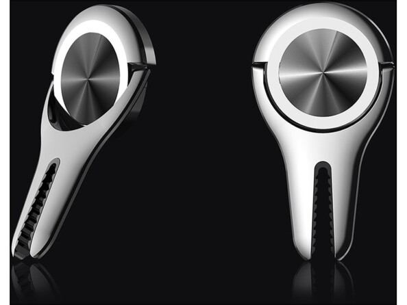 Support autocollant coloris noir avec pince pivotante pour téléphone disposé sur fond noir