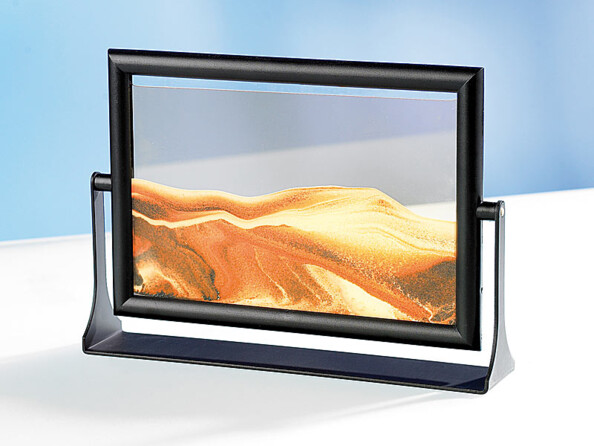 Tableau de sable décoratif posé sur une table