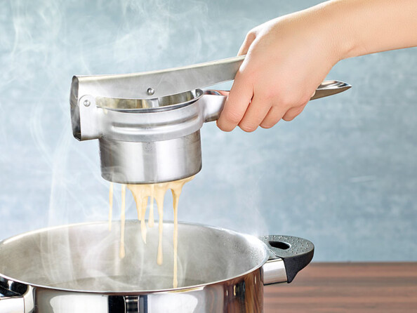 Presse-purée avec 2 grilles amovibles