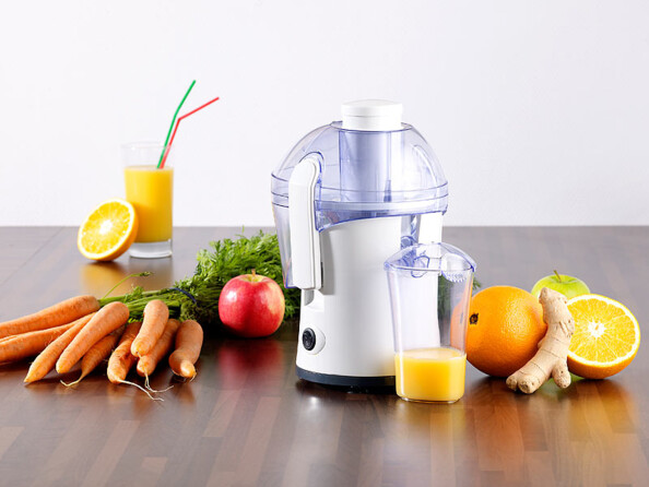 Centrifugeuse pour fruits et légumes mise en situation avec des aliments