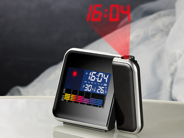 Réveil noir laqué avec bords argent mat avec projection de l'heure numérique en rouge