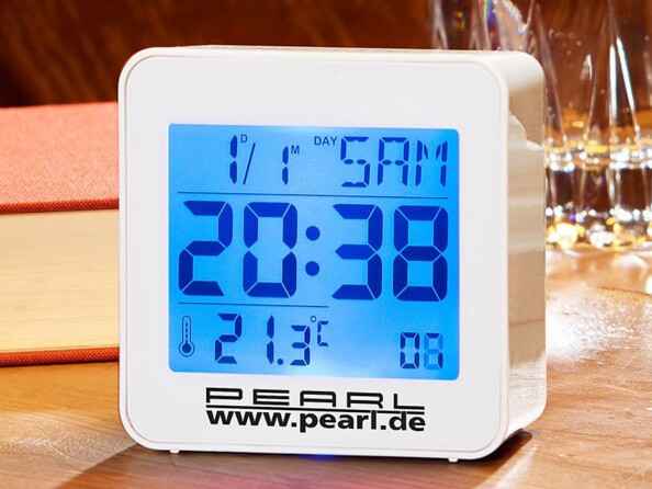 Réveil digital radio-piloté avec calendrier et thermomètre intégré
