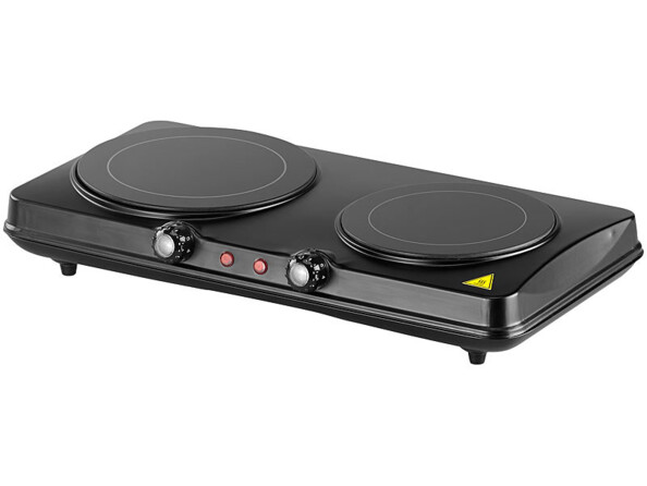 Surface de cuisson infrarouge noire sur pieds avec 2 plaques différentes et boutons de réglage pour chacune des plaques