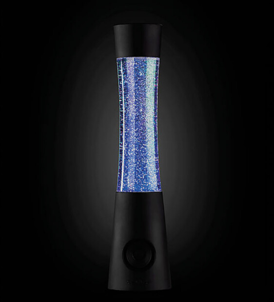 Lampe à paillettes sur fond noir dans l'obscurité avec LED bleues allumées et paillettes tourbillonnantes