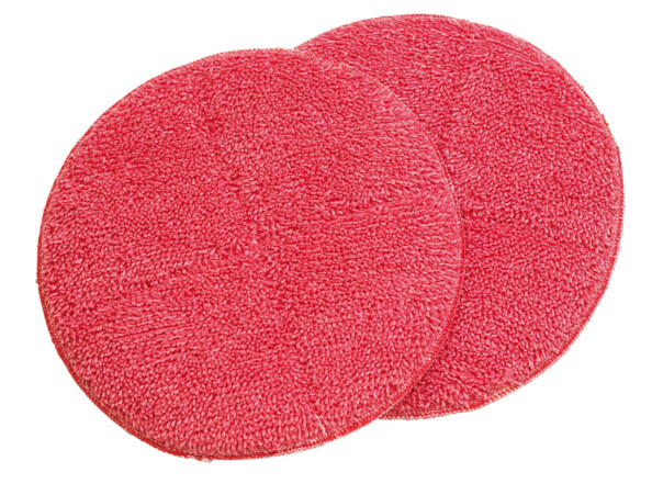 Deux disques ronds rouges en microfibre texturée se chevauchant sur fond blanc