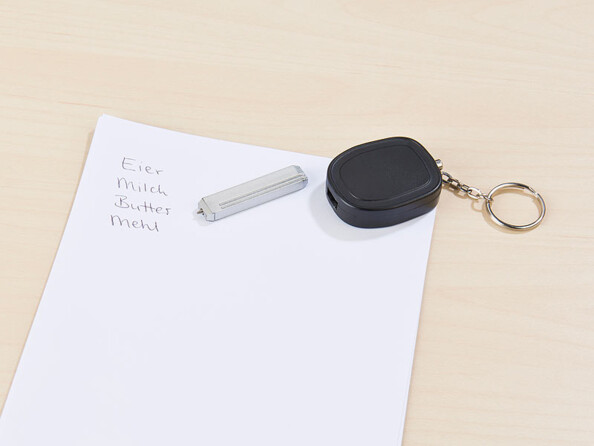 mini alarme de poche forme clé avec stylo a bille intégré dans le manche et porte clé