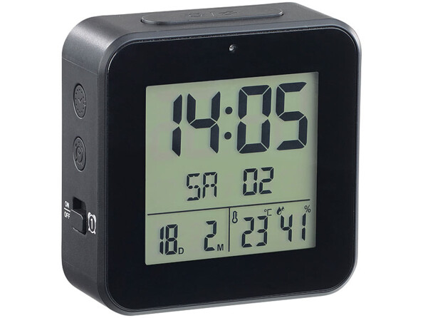 montre réveil piloté de profil avec affichage de la date, l'heure, la température, l'hygromètrie