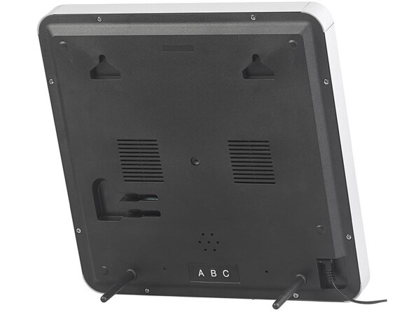 Horloge murale radio-pilotée à LED bleues vue arrière.