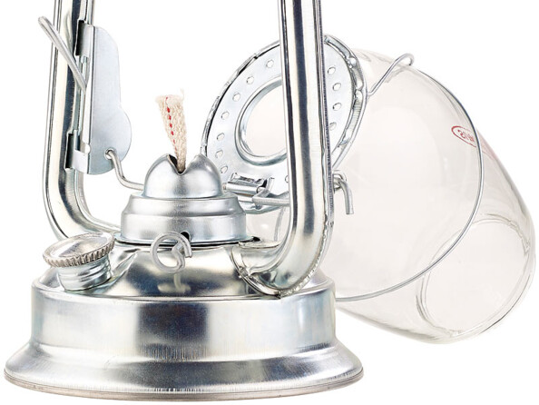 Vue rapprochée de la mèche dans son support avec verre de protection retiré pour allumage