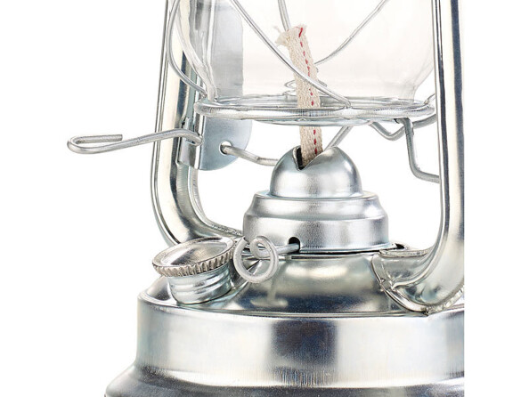 Zoom sur la molette de réglage de la taille de la flamme avec mécanisme à levier et mèche dans son support