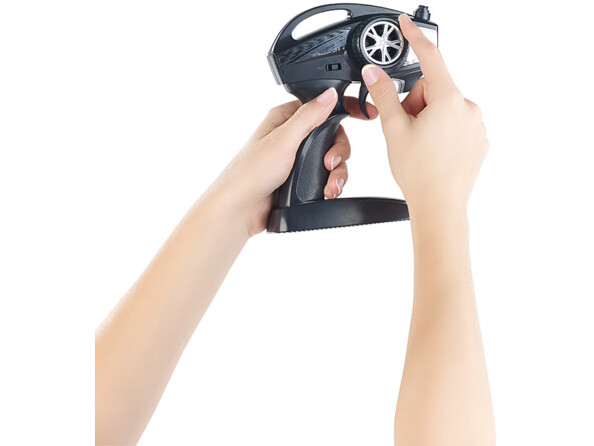 Voiture RC tout-terrain "Land Crawler" avec une télécommande avec manette pour avancer/reculer et vitesse, volant pour droite/gauche, interrupteur marche/arrêt et voyant de statut pour une utilisation facile