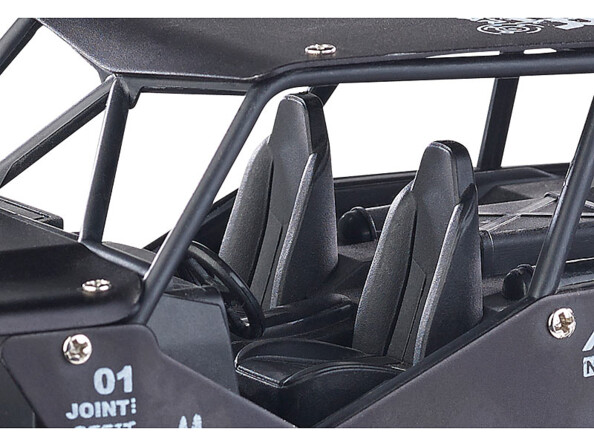 Monster-truck télécommandé avec une carrosserie robuste en métal : elle encaisse les chocs