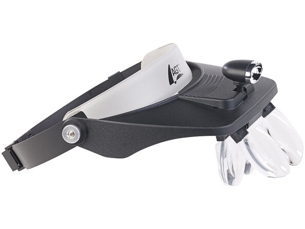 Côté droit de la loupe frontale avec lumière LED, logo AGT situé en arrière de la lampe et 2 lentilles fixées au support de la loupe frontale