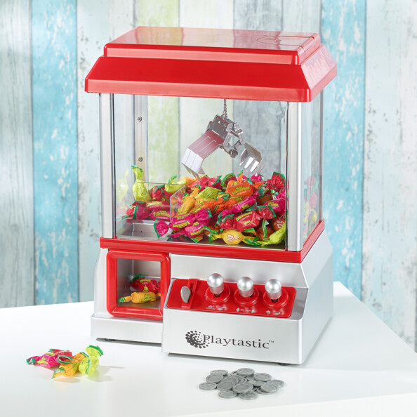 Mini machine à pince Playtastic. Le haut-parleur diffuse de la musique