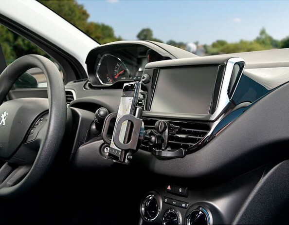 Support universel sur grille de ventilation avec socle téléphone