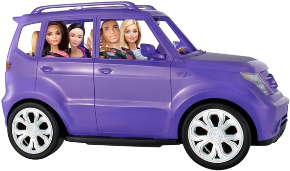 Quatre poupée Barbie dans le 4x4 violet décapotable Barbie.