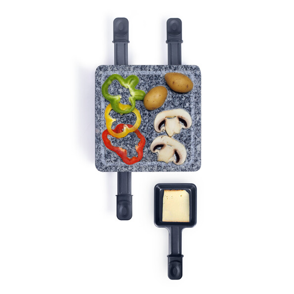 Mise en situation de l'appareil à raclette Livoo et son plateau en granit.