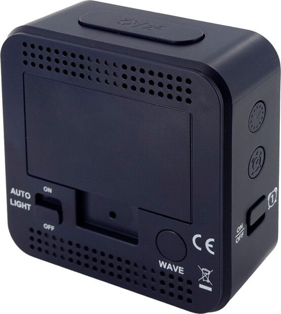 Face arrière du radio réveil piloté qui fonctionne avec des piles