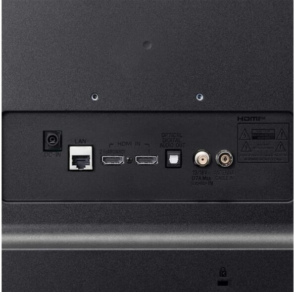 Zoom sur la connectique du périphérique avec 2 ports HDMI, 1 port 2,0 avec instructions d'avertissement, 1 Slot CI et 1 port LAN pour connexion réseau