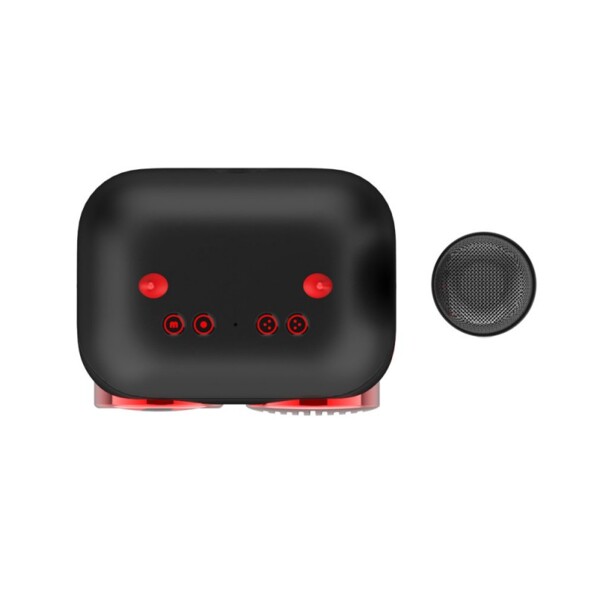 Vue du dessus du micro et du haut-parleur en forme de diablotin rouge et noir avec boutons de commandes et cornes sur le dessus de l'enceinte