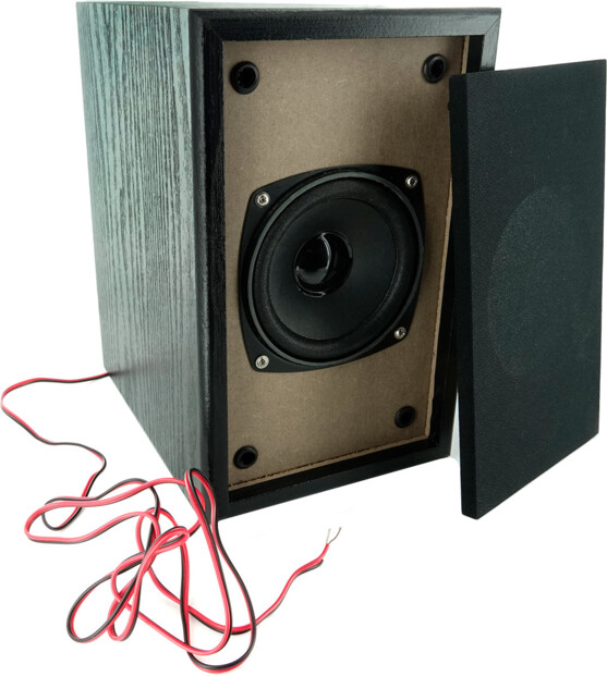 Haut-parleur dans un boîtier noir aspect bois avec cache avant retiré laissant apparaître le caisson intérieur avec câble de raccordement rouge et noir 2 m