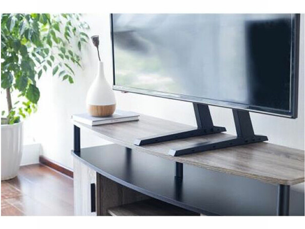 Pied de télévision avec hauteur ajustable mis en situation