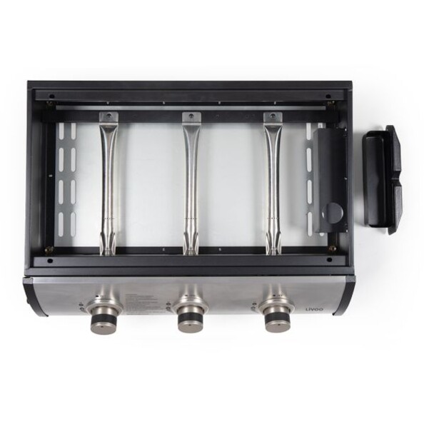 Plaque de cuisson retirée de la plancha vue du dessus avec aperçu des 3 brûleurs fonctionnant au gaz propane ou butane intégré dans l'appareil