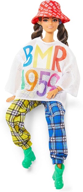 Poupée articulée Barbie stylé en position assise