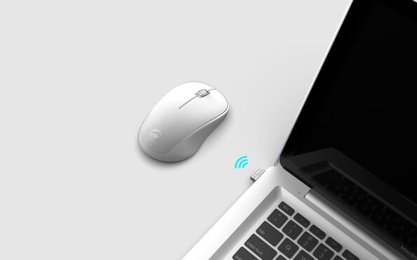 Mise en situation de la connexion sans fil entre la souris wifi Delta et un ordinateur portable éteint par le biais d'un signal 2,4 GHz schématisé par des ondes bleues