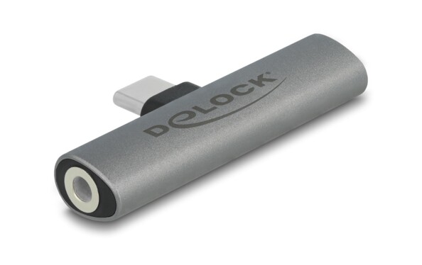 Adaptateur horizontal DeLock coloris gris avec connecteur central USB-C, connecteur gauche jack stéréo femelle 3,5 mm et connecteur droit USB-C femelle