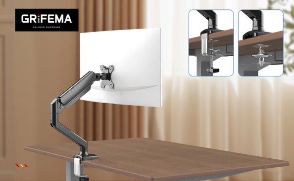 Support pneumatique réglable pour moniteur Grifema installé sur un bureau en bois