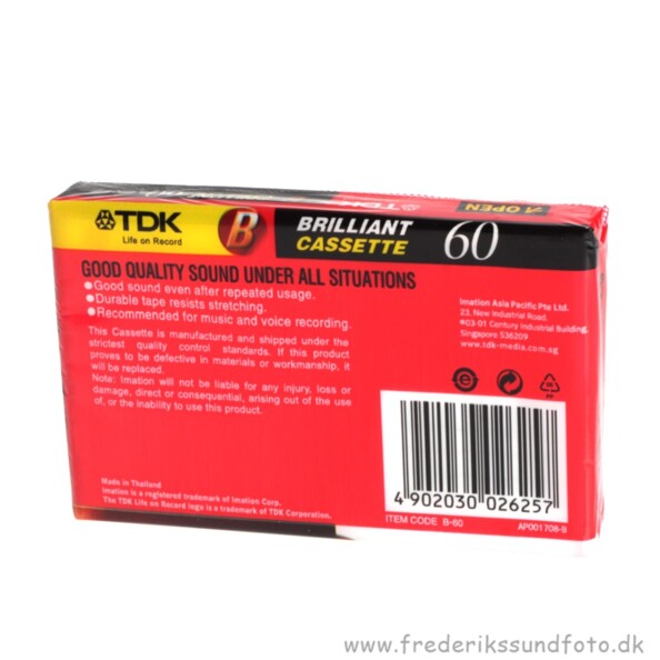 Vue arrière de l'emballage de la K7 audio TDK avec spécifications techniques, code-barres et données diverses d'importation