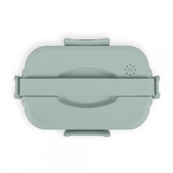 Vue du dessus sur le couvercle avec poignée, trous d'évacuation de vapeur et fermeture à clip