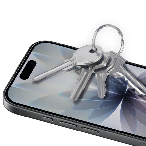 Mise en situation de la vitre de protection en verre trempé sur un iPhone 17 allumé protégeant l'écran contre les rayures de clés