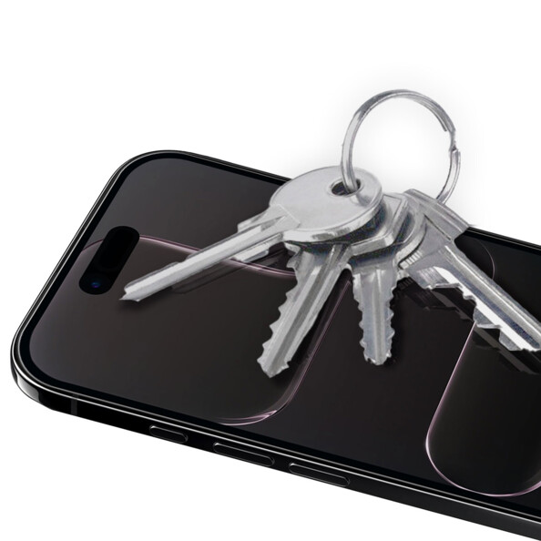 Mise en situation de la vitre de protection en verre trempé sur un iPhone 17 Air allumé protégeant l'écran contre les rayures de clés