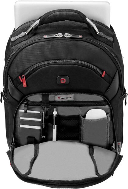 Vue du dessus sur l'intérieur de la poche d'accès rapide à fermeture à glissière avec accessoires informatiques organisés et poignée de transport