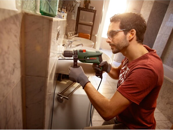 Perceuse à percussion Bosch EasyImpact 630 filaire avec mandrin Autolock