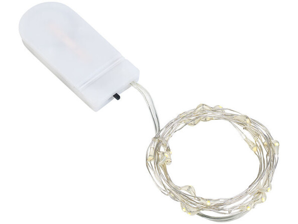 Guirlande lumineuse à LED et son boîtier d'alimentation et de commande enroulée sur elle-même