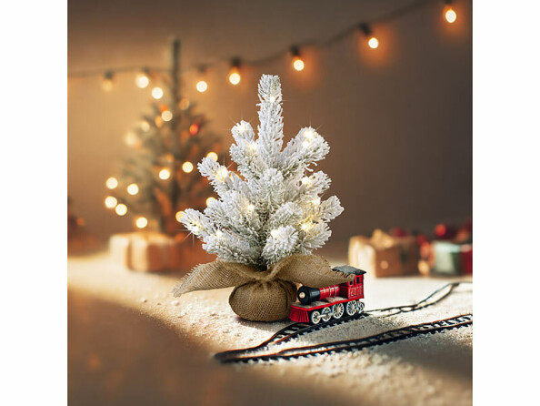 Sapin de Noël factice enneigé 20 LED - 26 cm