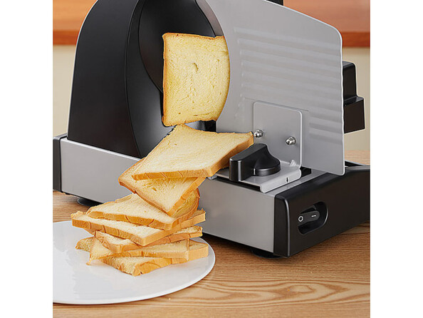 trancheuse électrique avec 2 lames en acier inoxydable ASM-100 vue de tranches de pain de mie tranchées