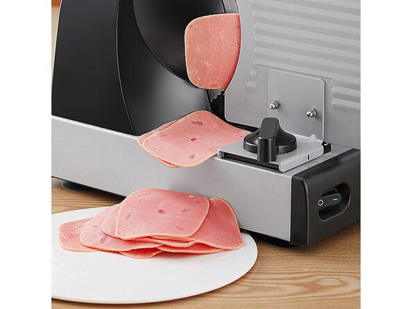 trancheuse électrique avec 2 lames en acier inoxydable ASM-100 vue de tranches de jambon tranchées