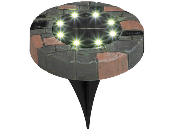 Lampe de sol aspect pierre avec LED rechargeables par l'énergie du soleil.