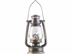 Lampe tempête à LED de Noël Infactory avec neige tourbillonnante.