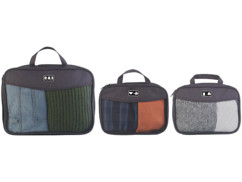 Trois sacs à vêtements compressibles.