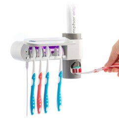 Support familial pour brosses à dents avec distributeur de dentifrice et stérilisateur UV. 