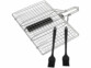 Panier à grillades en acier inoxydable avec poignée rétractée et pinceaux posés dessus